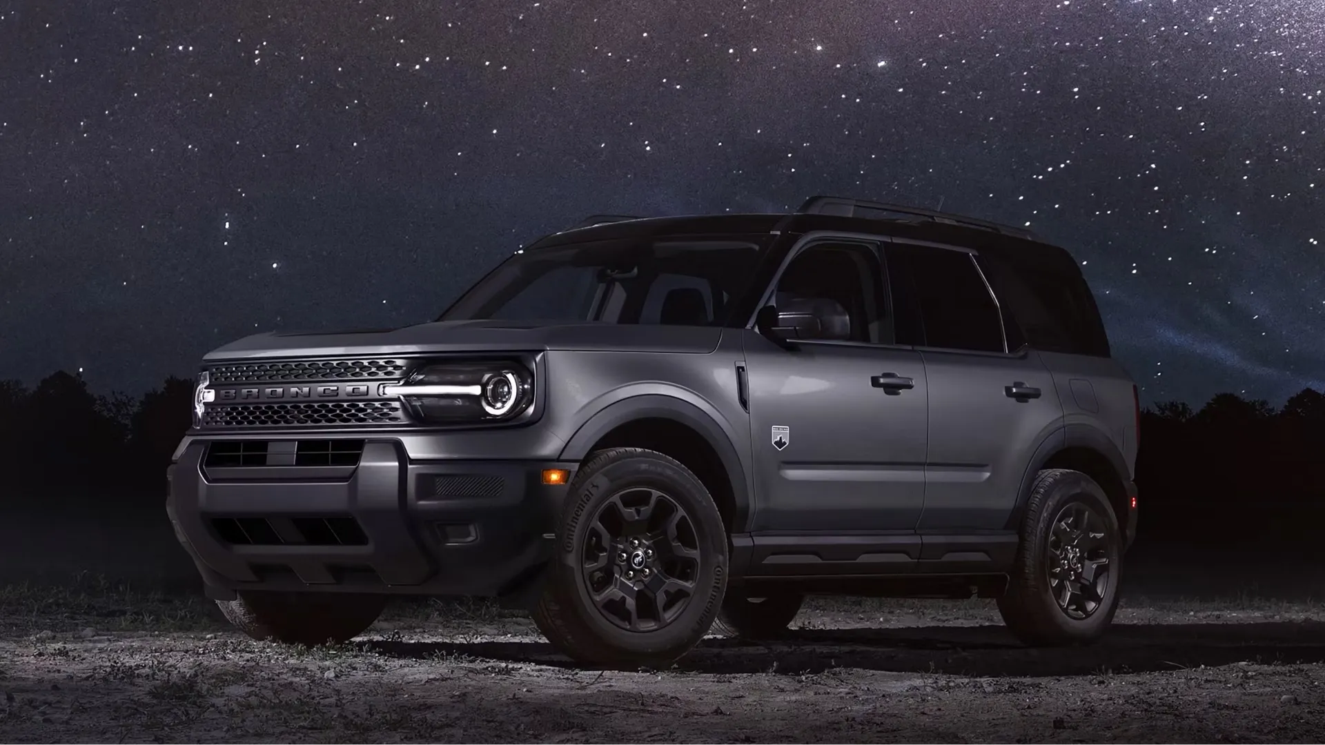 Ford Bronco Sport 2026 sous un ciel étoilé, VUS compact idéal pour le camping et les aventures hors route.